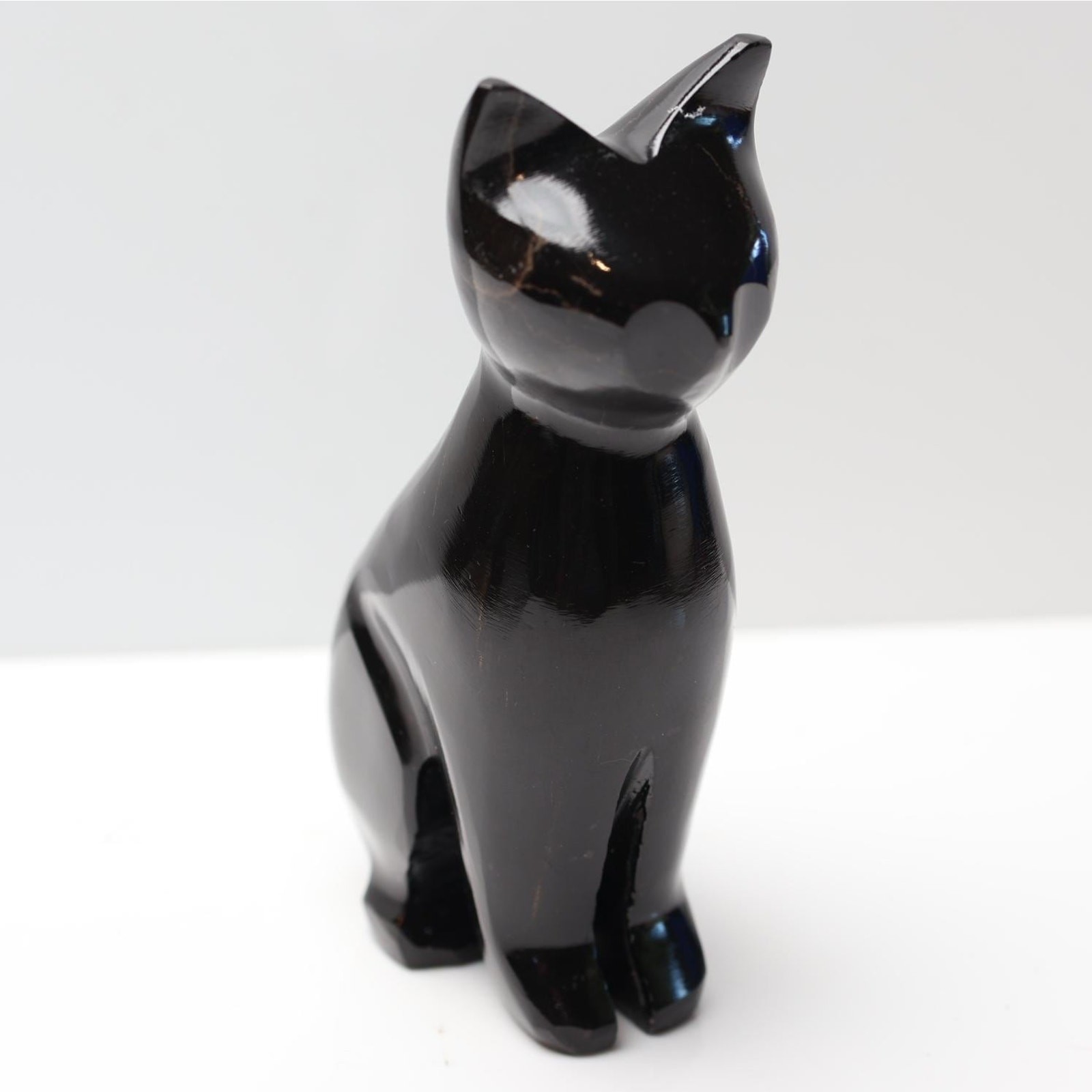 Glossy Black Onyx Cat Sculpture with UV Fluorescence
