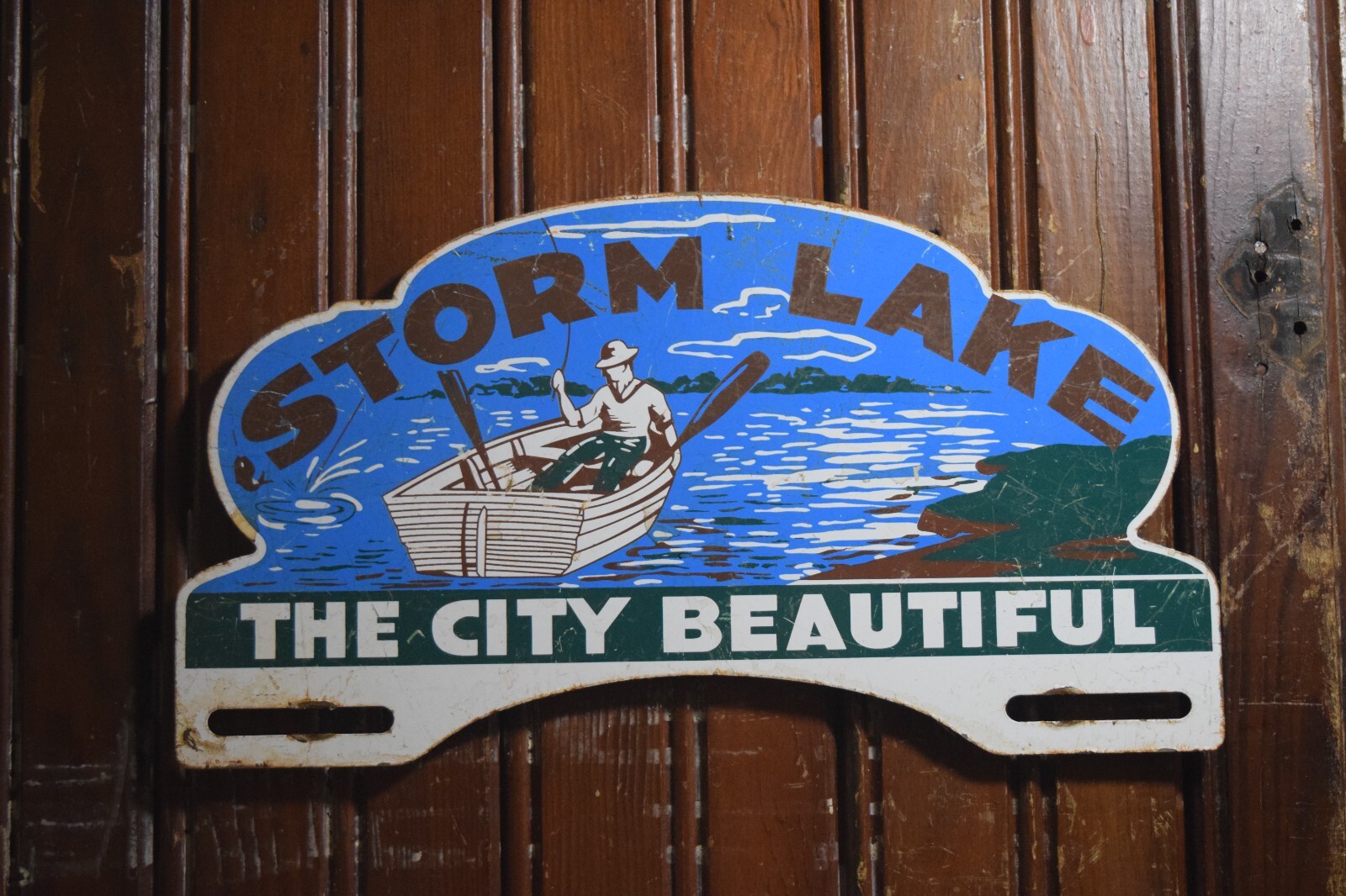 STORM LAKE THE CITY BEAUTIFUL PAINTED METAL TOPPER SIGN FISHING BOAT RUSTY