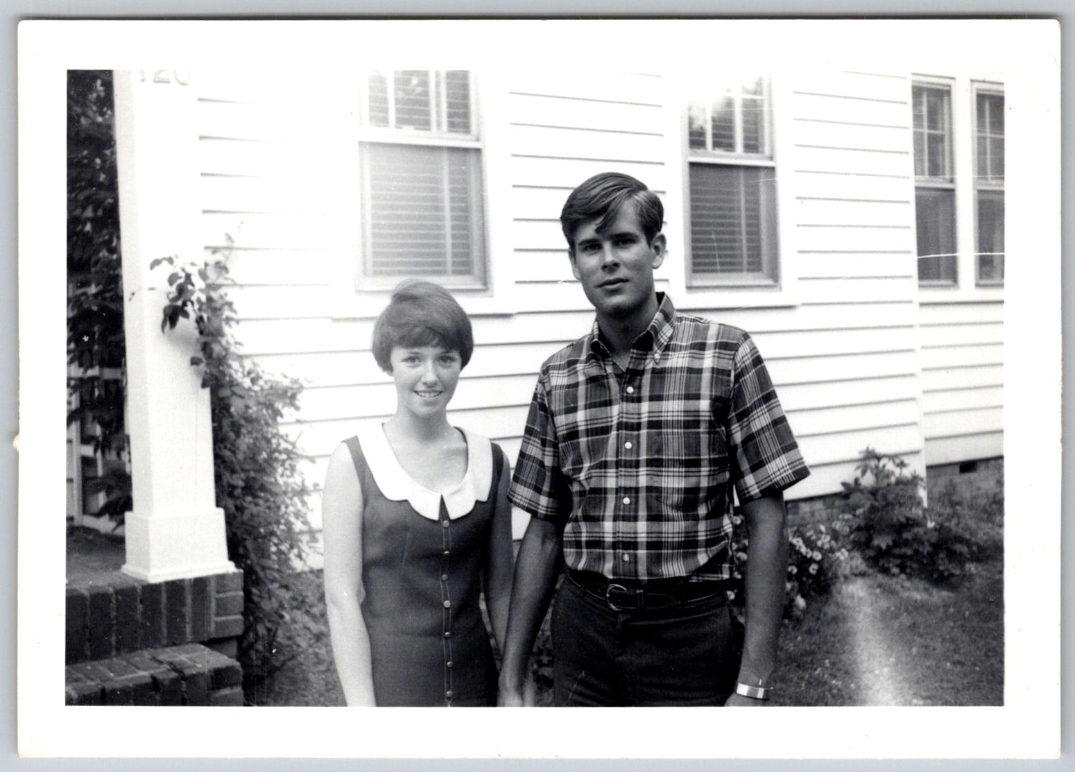 Vtg B&W Snapshot Young Couple Man Plaid Shirt Woman Pixie Cut House 1968