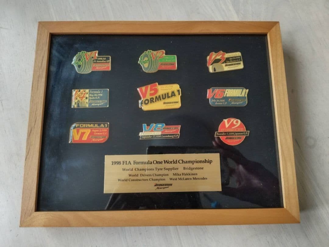 1998 FIA Formula 1 World Championship Bridgestone Pin Badge Set of 9 Framed