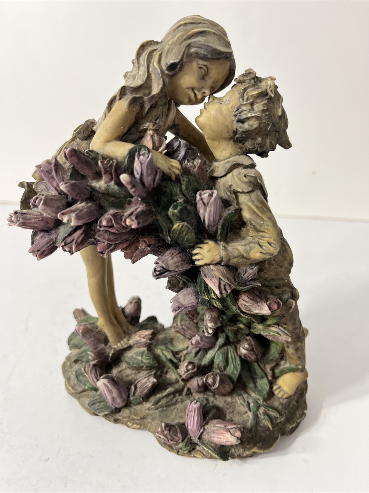 Vintage 8 Inch Kissing Boy and Girl In Tulips Resin Figurine Beautiful