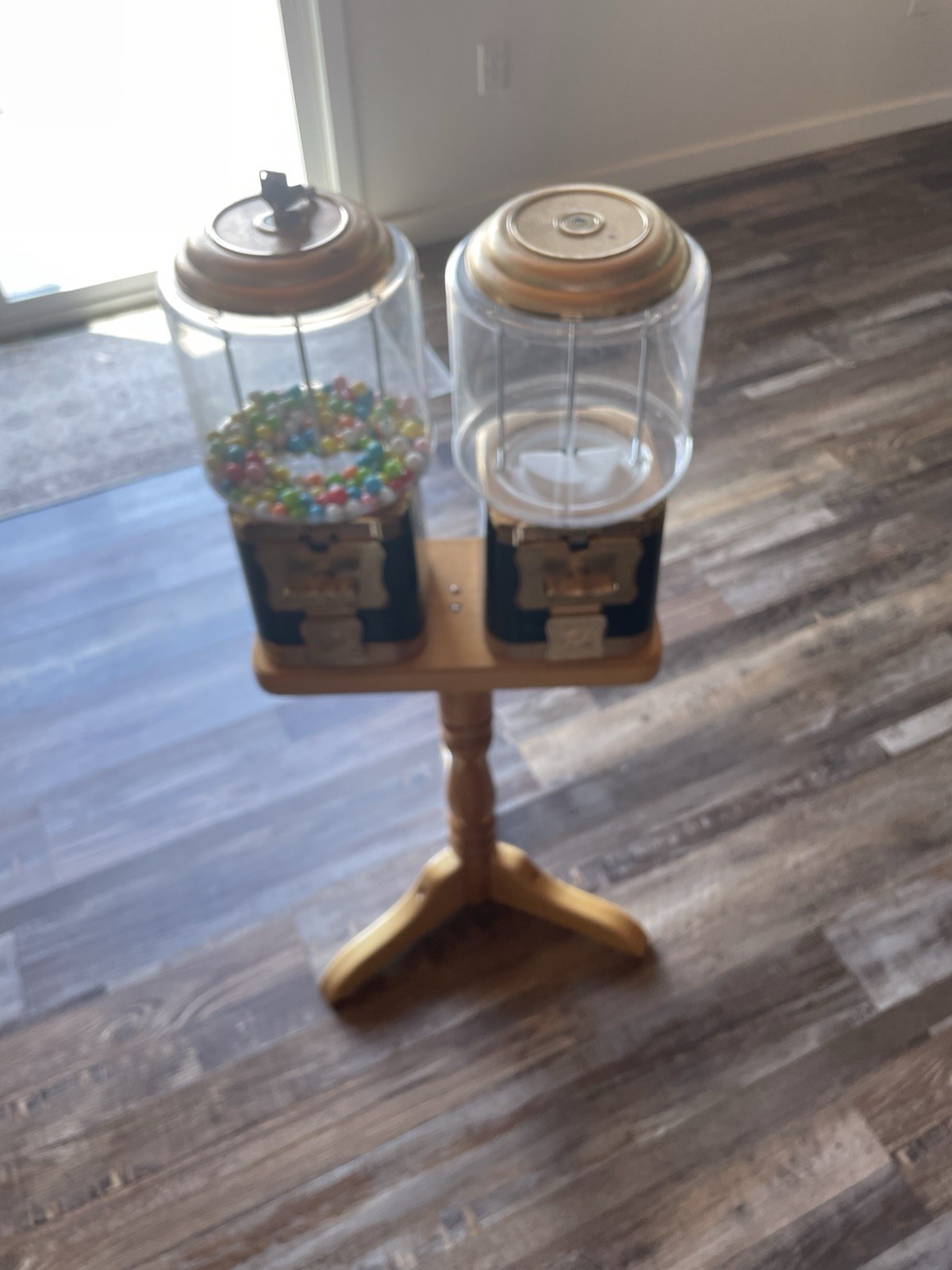 Antique Double Gumball Machines on Wooden Stand. Both w/keys. Local Pick up Only