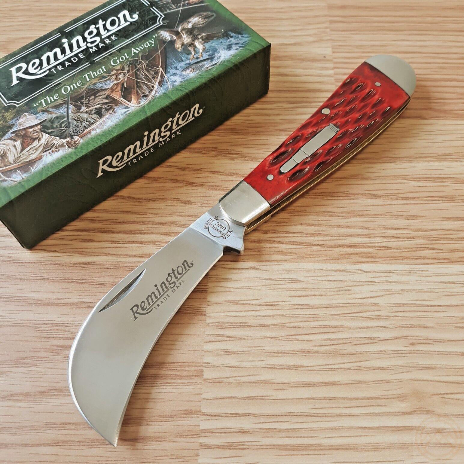 Remington 2023 Hawkbill Bullet Folding Knife 440 Steel Blade Red Jigged Bone