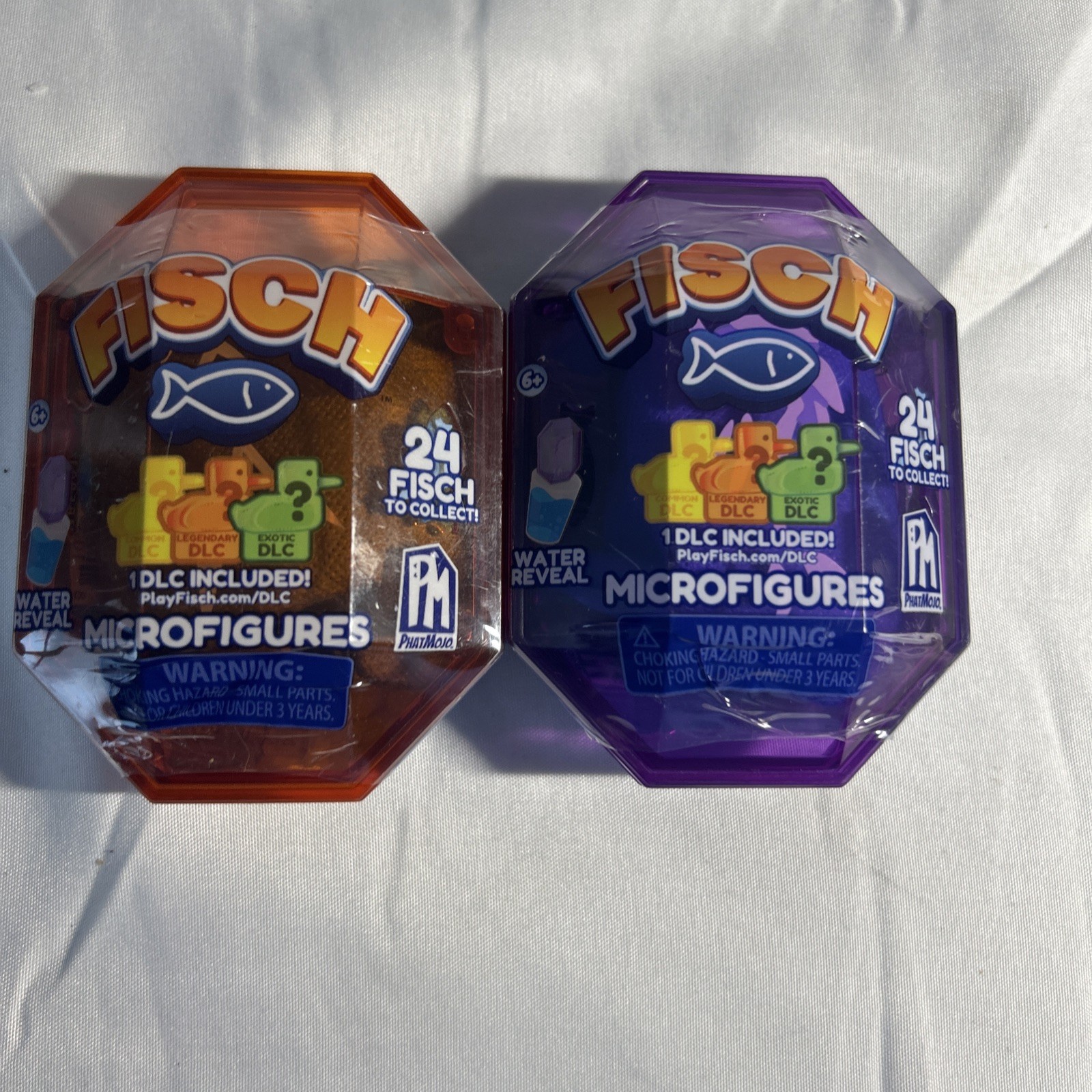 Lot Of 2 Fisch Mystery Micro figures Sealed with DLC Code Collect them all