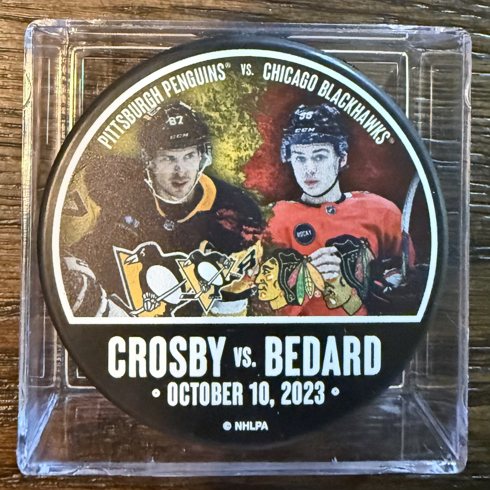 Sidney Crosby vs. Connor Bedard Souvenir Puck / Penguins vs. Blackhawks 10/10/23