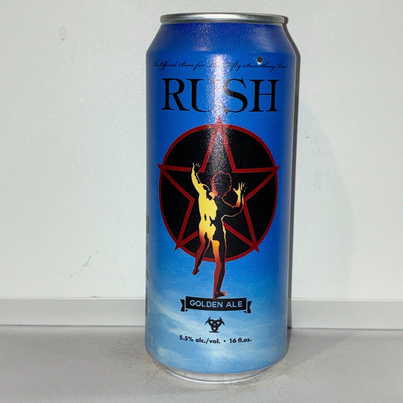 Rush Golden Ale (2026 Fifty Something Tour) beer can, bottom opened, empty
