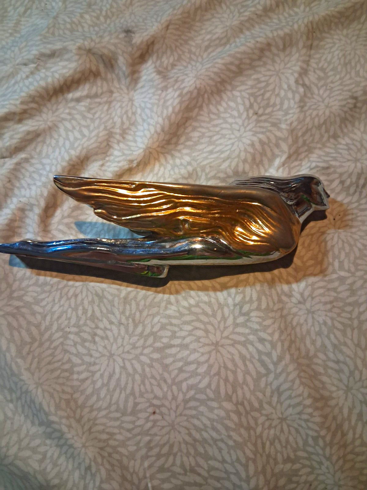 Gold And Chrome Cadillac Flying Goddess