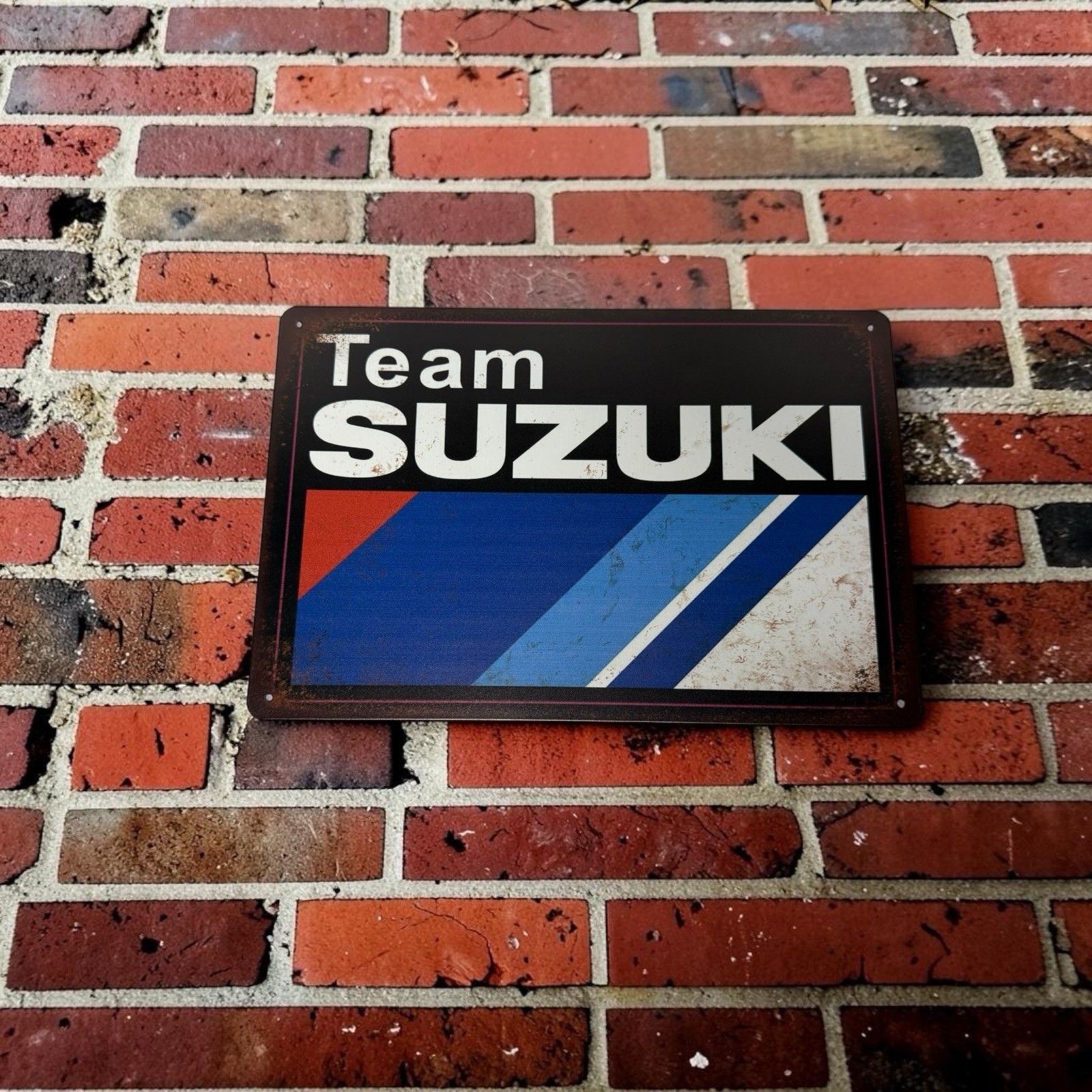 Team Suzuki Metal Tin Sign Rustic Patina Garage Shop Wall Decor 11.75