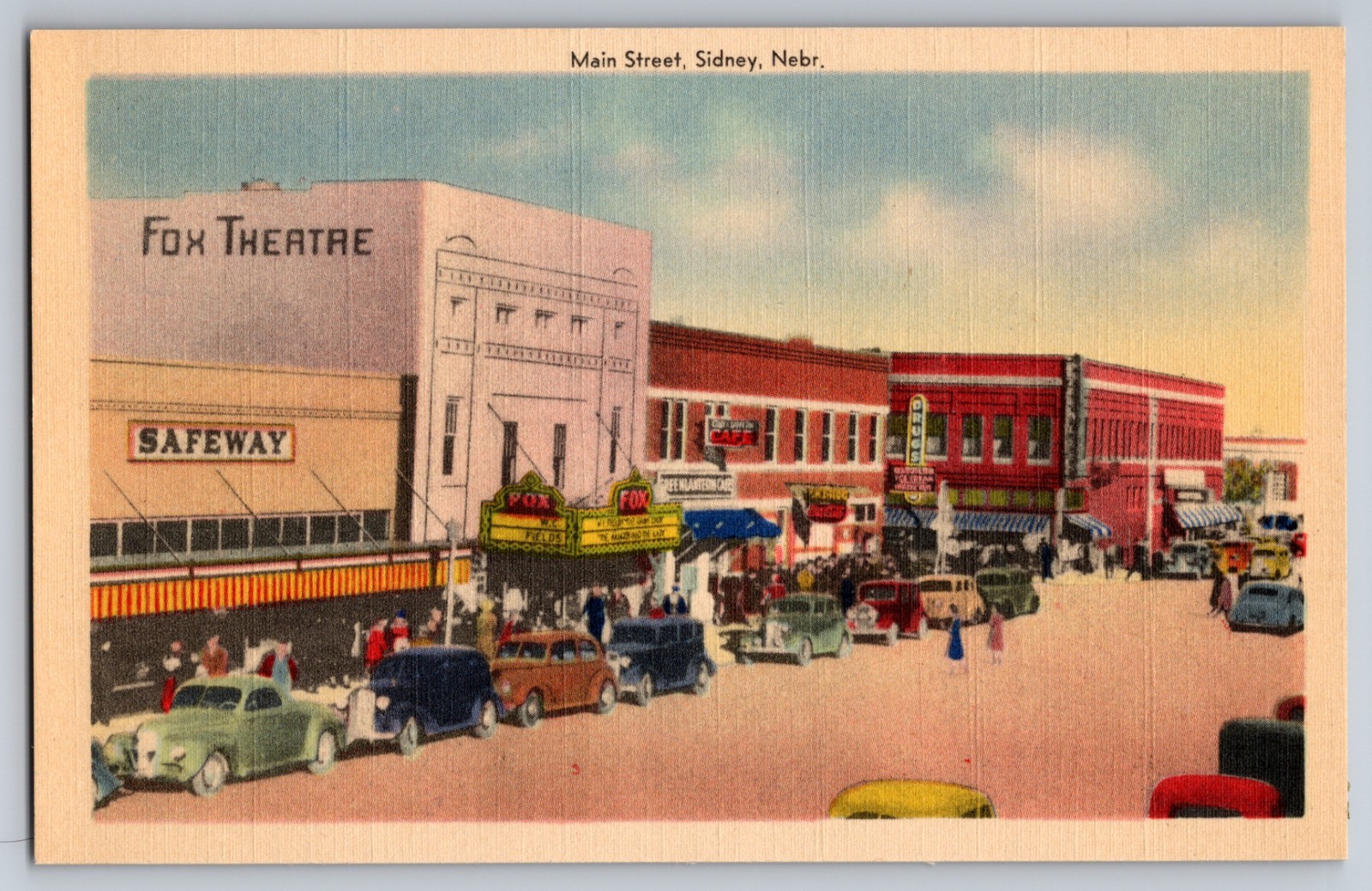 Sidney Nebraska NE Street Scene Main St Cars Safeway Fox Theatre Vtg Postcard
