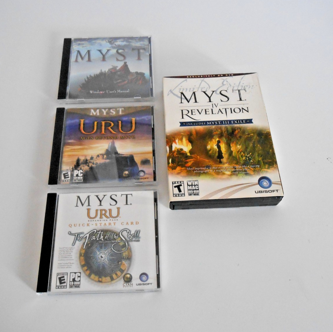 Lot of (4) Myst PC games - Myst, URU Ages, URU Exp Pack, Myst IV Revelation