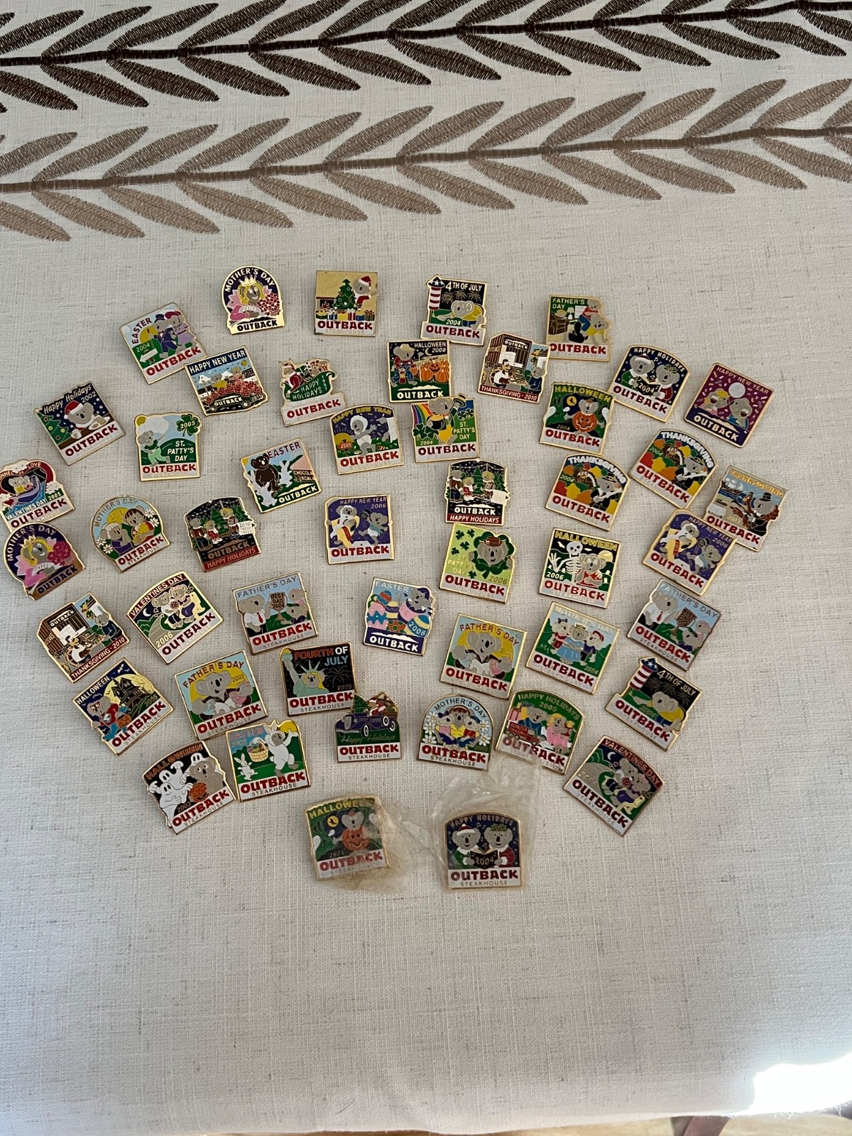 Lot of 48 Vintage Outback Steakhouse Lapel Pins