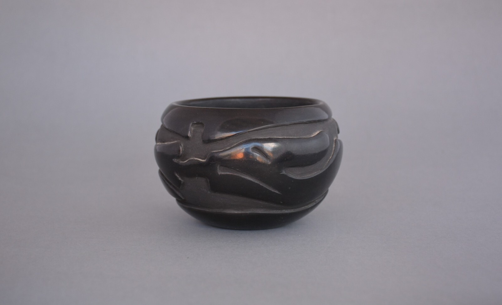 Christina Naranjo - Santa Clara Deeply Carved Black Pot - Avanyu Design