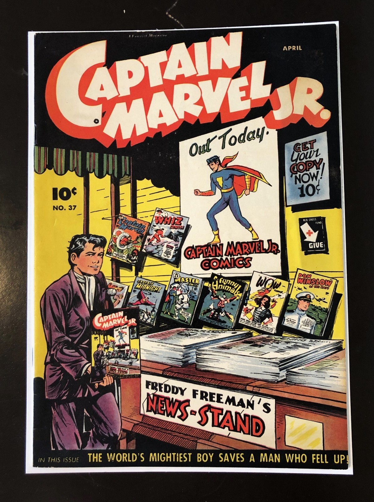 Captain Marvel Jr. #37. FN- 5.5. Comic Book News-Stand Infinity Cover. 1946.