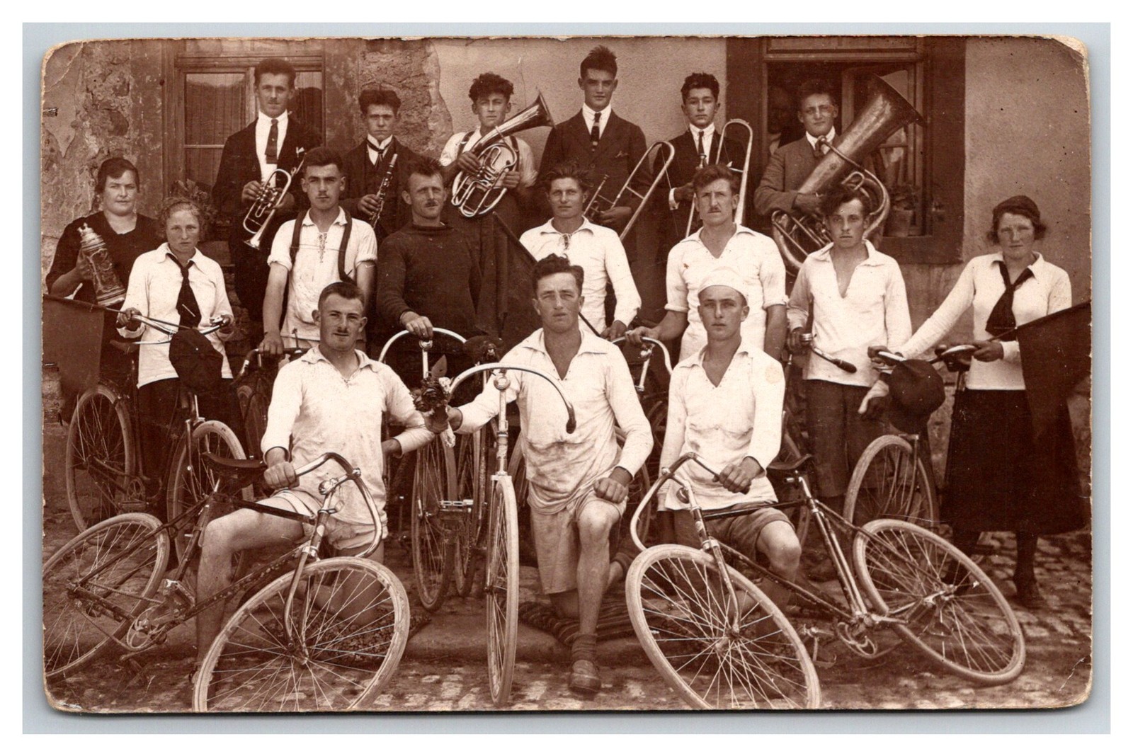 RPPC touring bicycle Cyclists & musicians Band wind instruments tuba.