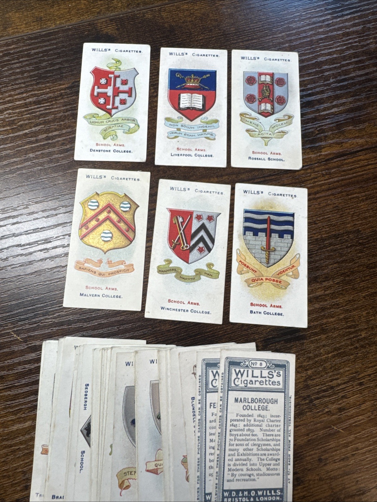 1906 W.O. & H.O. WILLS SCHOOL ARMS 50 DIFFERENT TOBACCO CARD SET