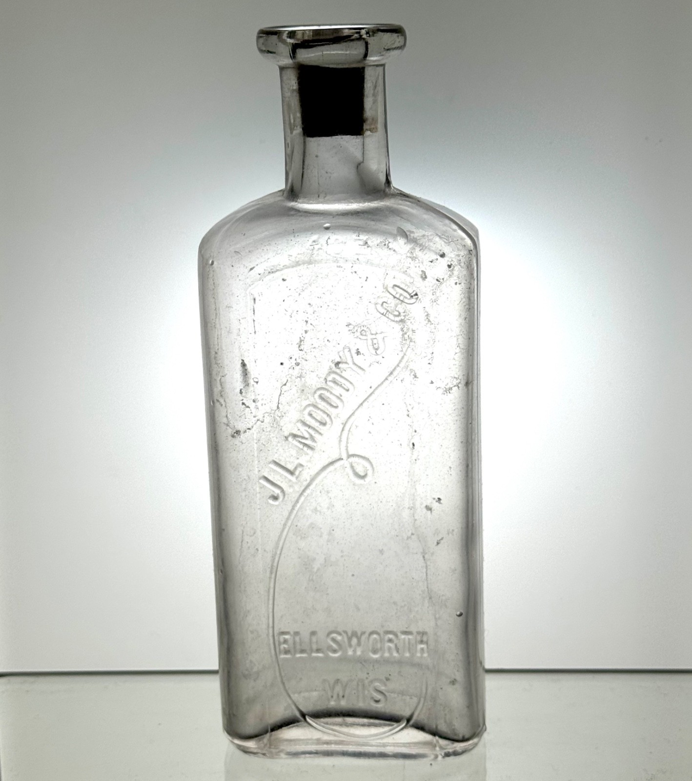 J.L. Moody & Co Ellsworth, Wisconsin Antique druggist style or pharmacy bottle