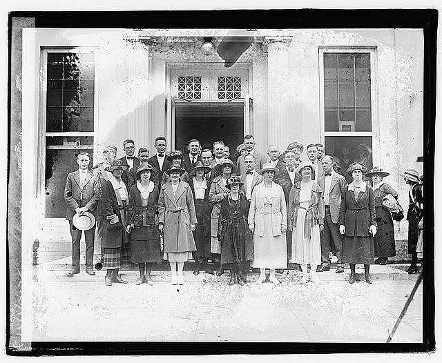 Photo:Unidentified Group Building Steps 1921 Men Women Portrait