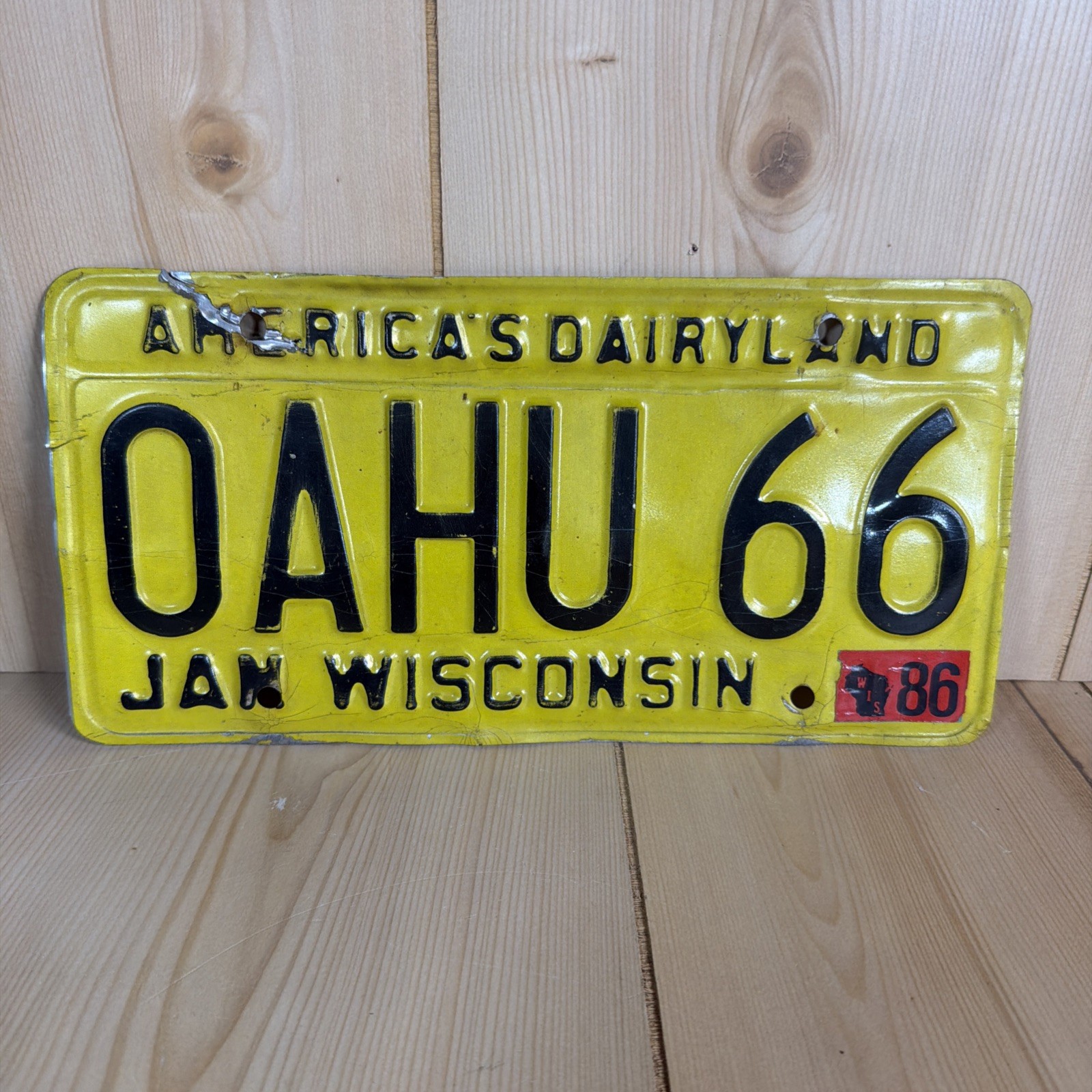 Vintage 1986 Wisconsin Yellow License Plate America\'s Dairyland Custom Oahu 66