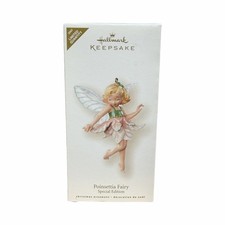 2007 Hallmark Repaint Fairy Messengers Poinsettia Fairy Special Edition Ornament picture