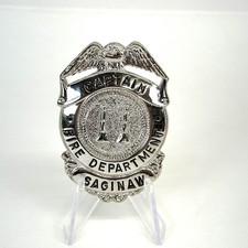 vintage obsolete Fire Department Captain Badge Saginaw  picture