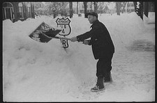 Photo:Woodstock Vermont 1930s Snow Storm Man Shoveling US 4 Road Sign FSA picture