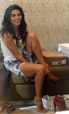 Angie Harmon Putting On The Shoe 4x6 Picture Celebrity Print picture