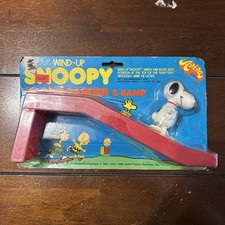 New MoC Vintage 1970s Aviva Snoopy Skateboarder and ramp wind up toy figure picture