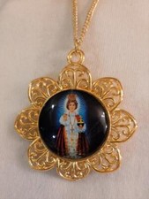 Delightful Petaled Rim Colorful Infant of Prague Cameo Medal Goldtone Necklace picture