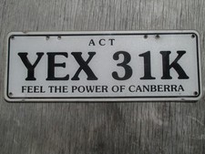 c2010 Australian Capital Territory white plastic Feel the Power license plate picture