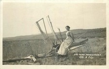 RPPC Woman on Reaper 320 Acre Homesteads Q.L.&I. Co. Oregon Farming picture