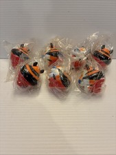 Group of 7 2003 Kellogg Cereal Spinning Tops NIP- Tony The Tiger picture