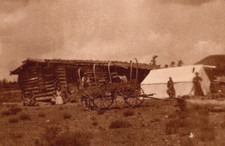 RPPC Real Photo Postcard - Pioneers Covered Wagon Log Cabin Tent Cowboys  c1910 picture