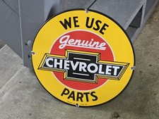 VINTAGE WE USE GENUINE CHEVROLET PARTS  PORCELAIN SIGN 12