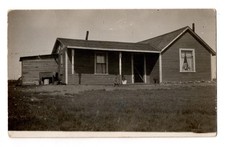 Boy Sitting On Porch Early Plain Jane Wood Frame House Photo Postcard RPPC picture