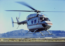 1980s MBB Kawasaki BK 117 Helicopter In Flight Over Desert 35mm Slide picture