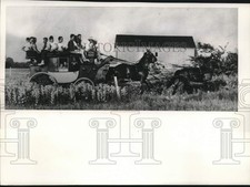 1964 Press Photo James Lovell Jr. Rides Stagecoach 'Tally Ho' On Farm picture