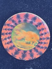 Vintage pog with thick Holographic dinosaurs graphic picture