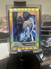 Cloak & Dagger Gold Foil /50 - 2026 Topps Mint Marvel #52 Silver SP picture