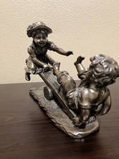 Figurine of Girl and Boy Playing on Seesaw, Cold Cast Bronze Effect Finish picture