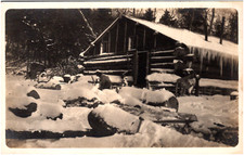 Snow Covered Log Cabin in Winter Long Icicles 1910s RPPC Postcard Photo picture