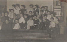 LARGE GROUP OF WOMEN GATHERED ON A STAGE REAL PHOTO POSTCARD 1906 RPPC picture