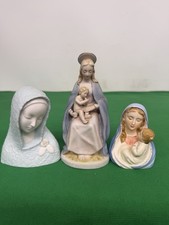 I Said A Three Mary Figurines Two Of Them Is Holding Baby Jesus picture