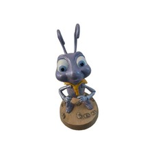 “WDCC A Bug’s Life Blueberries Rock Dot Figurine” picture