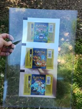 Pokemon Base Set Booster Pack Uncut Wrapper Charizard Blastoise Venusaur  G2U picture