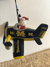 Michigan Wolverines NCAA Ceramic Airplane Santa Hanging Christmas Ornament 2005 picture