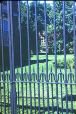 c1950's Kodachrome Red Border 35mm Slide Iron Fence Brick Building Garden Lawn picture