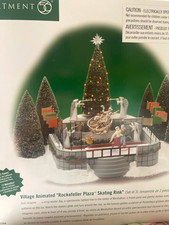 DEPT 56  ROCKEFELLER  PLAZA SKATING RINK  56.52504 HAS MUSIC & MOVEMENT  NEW picture