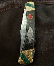 Buck 110 custom knife by Ghostown Custom Knives.