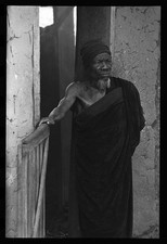 Photo:Nigeria Africa 1900s Elderly Man in Robe at Doorway picture