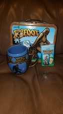 Bigfoot Lunchbox Lot with Mug, Spoon, Bandages, and Enamel Pin picture